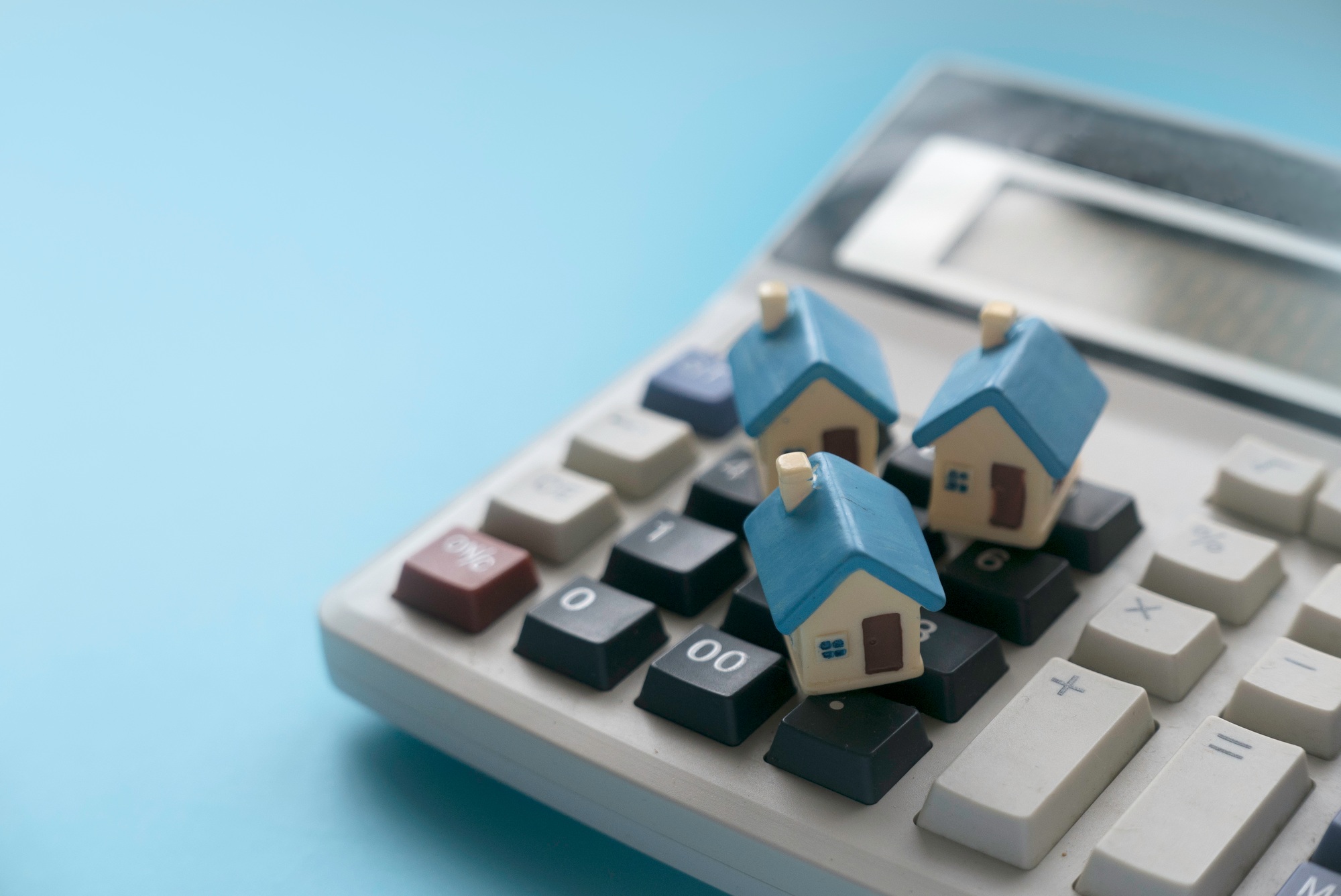 Concept of home loan mortgage, refinance, interest rate. Saving for house.